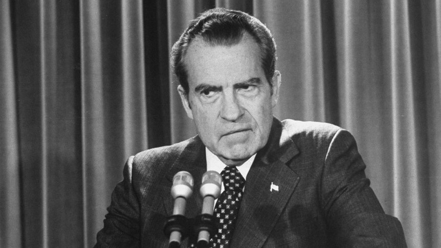 Richard Nixon scowls as he gves a press conference during the Watergate scandal of 1974.