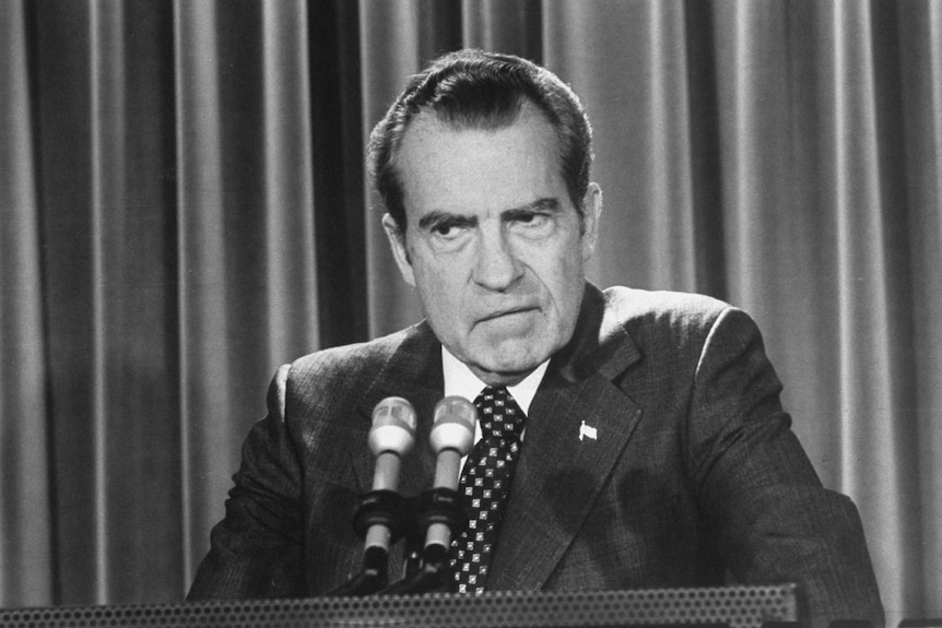 Richard Nixon scowls as he gves a press conference during the Watergate scandal of 1974.