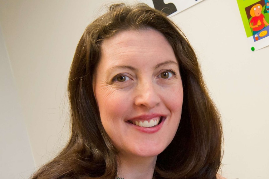 A head shot of a smiling Sonia Allan.