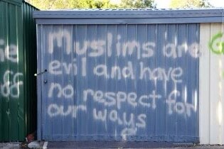 Graffiti at the Holland Park mosque in Brisbane says Muslims are evil and don't understand our ways.
