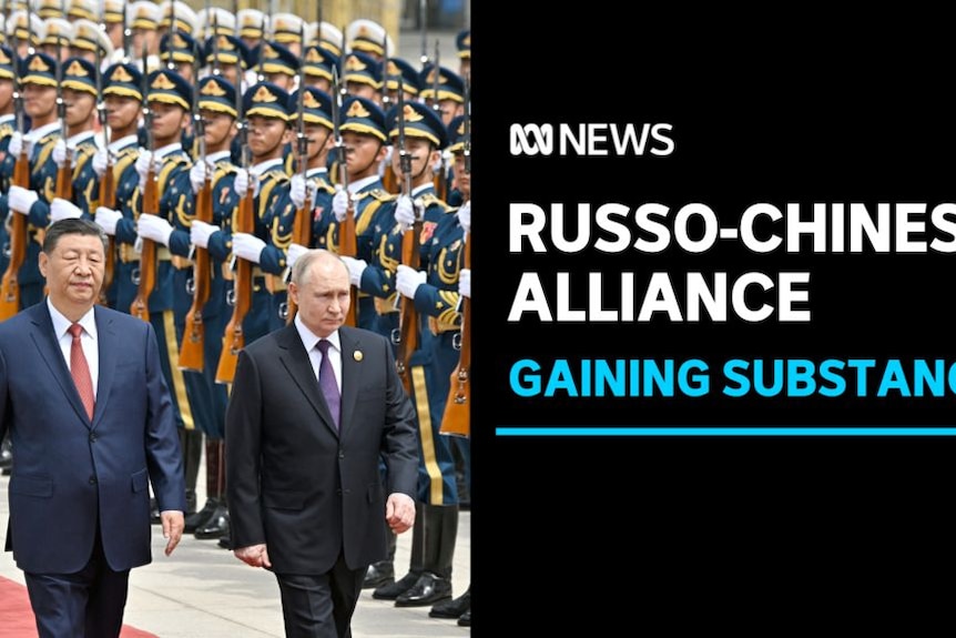 Russo-Chinese Alliance, Gaining Substance: Xi Jinping and Vladimir Putin walk down a red carpet lined with an armed guard.