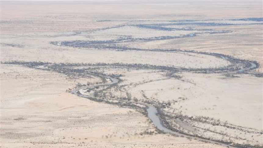 Aerial view of flood water heading south towards Lake Eyre