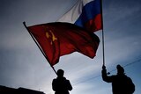 Men wave Russian flag in Crimea