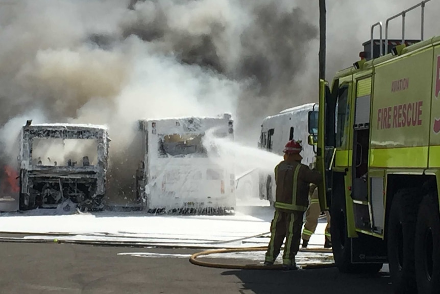 Three Carbridge buses on fire at Sydney Airport in December 2016