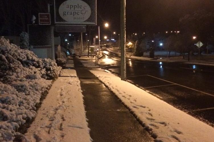 Snow lines the footpaths of Stanthorpe