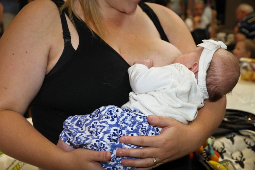 A mother breast feeding at a Bendigo shopping centre