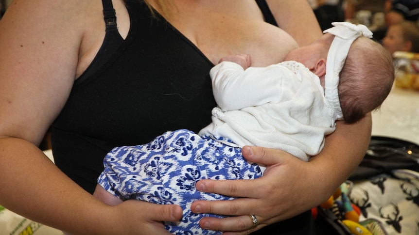 A mother breast feeding at a Bendigo shopping centre