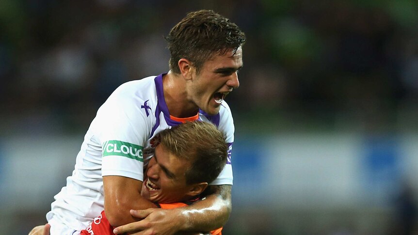 Late winner ... Perth Glory's Joshua Risdon celebrates the scorcher that sent the Victory packing.