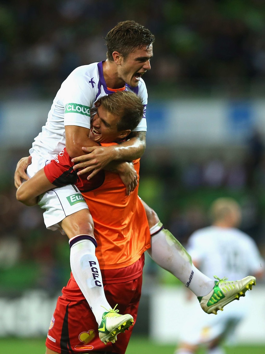 Late winner ... Perth Glory's Joshua Risdon celebrates the scorcher that sent the Victory packing.