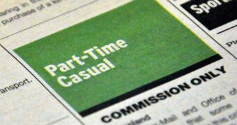 Job ads in a newspaper.