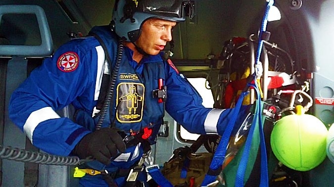 NSW Paramedic Mick Wilson in a helicopter while working as a paramedic.