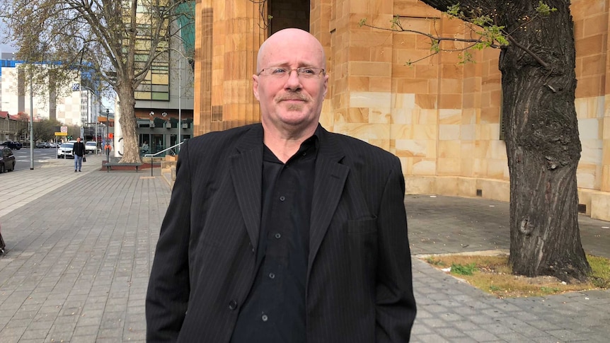 Michael Andrew Mullen walking outside of court in Adelaide