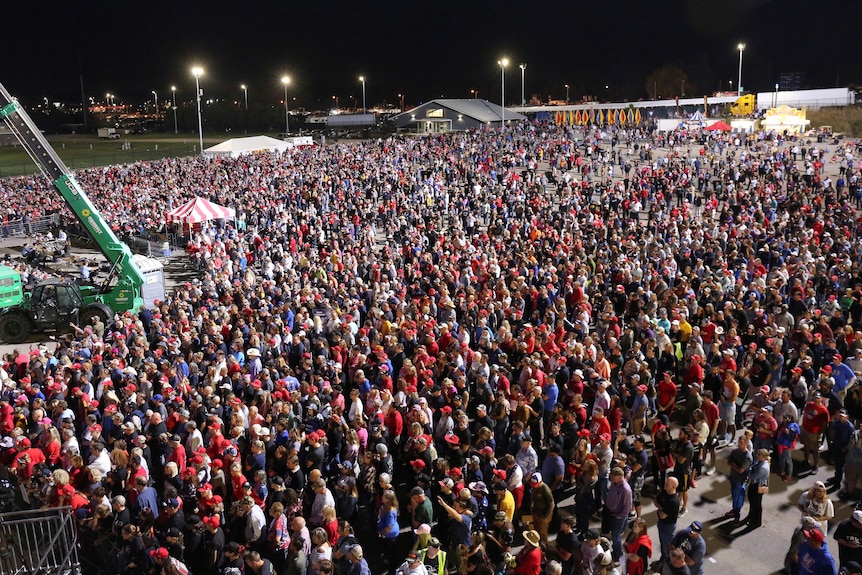 Supporters of former U.S. President Donald Trump gather for a rally at the Iowa States Fairgrounds