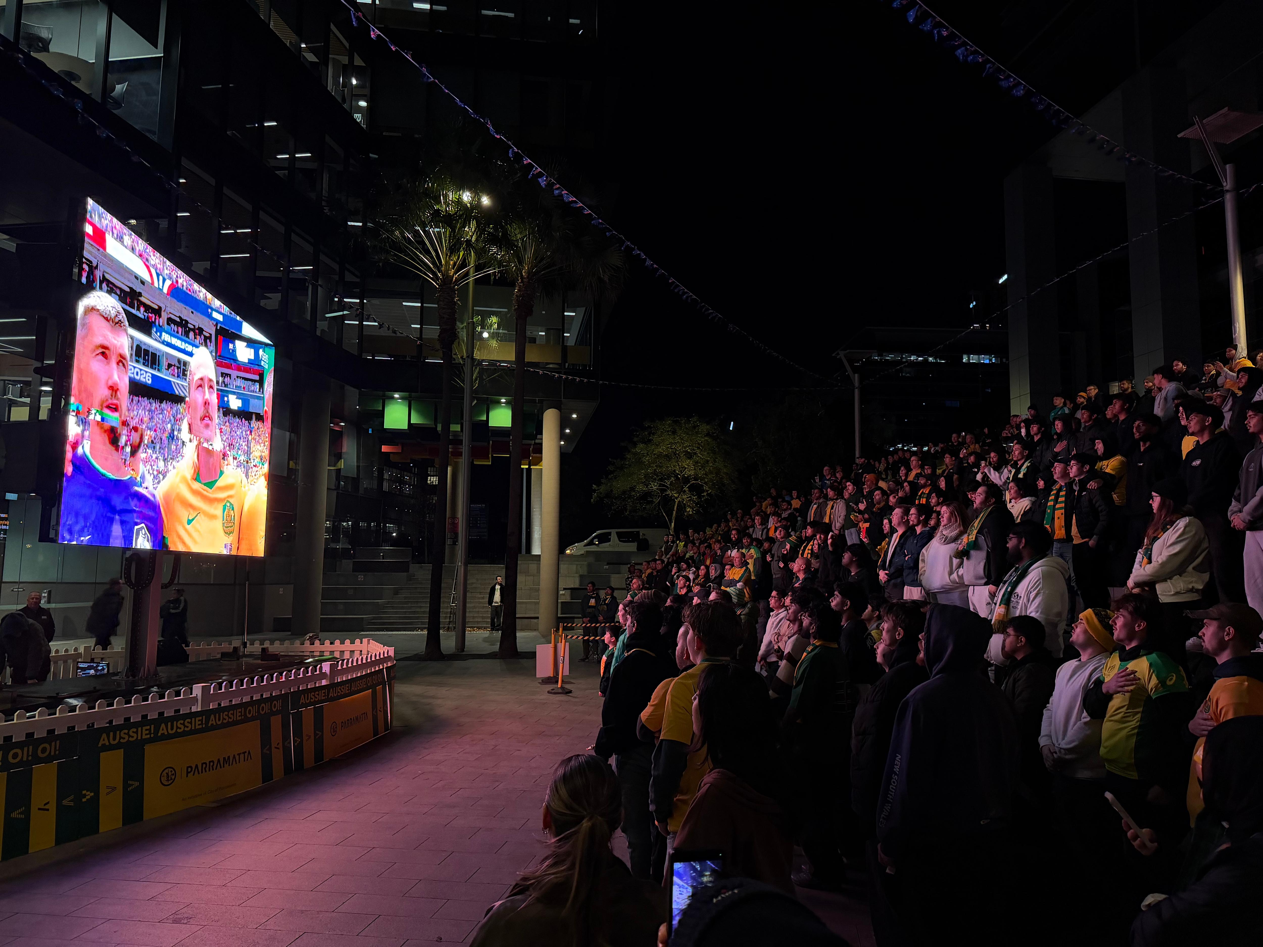 People watching a big TV