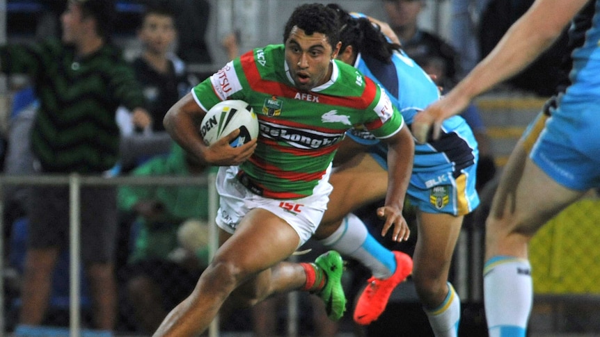 Alex Johnston scores a try for South Sydney against Gold Coast at Robina.