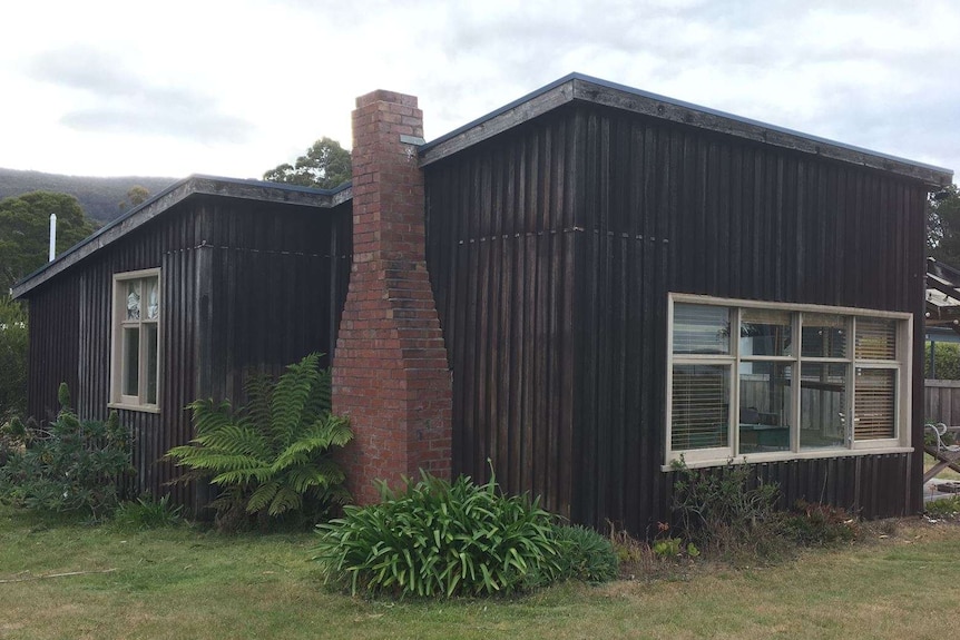 Tasmanian beach shack in an unidentified location.