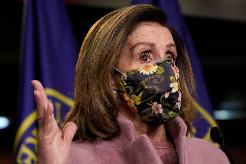 House Speaker Nancy Pelosi gestures during a new conference