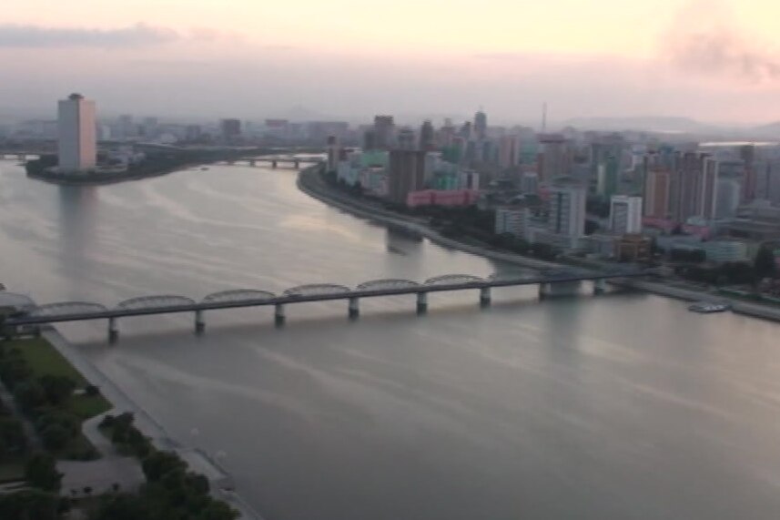 A photo of buildings and a bridge in Pyongyang, North Korea