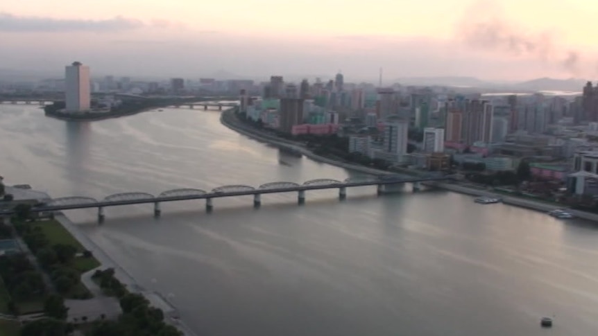 A photo of buildings and a bridge in Pyongyang, North Korea