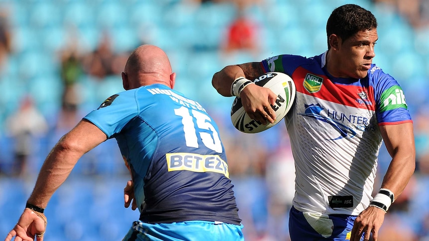 Convincing win ... Newcastle's Dane Gagai ghosts past the Titans defence.