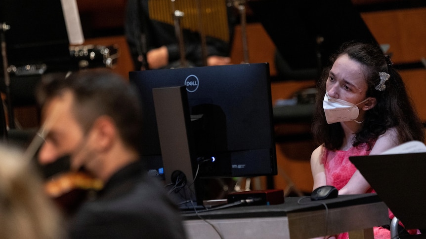 Alexandra Kerlidou, who has cerebral palsy, plays the "Eyeharp"