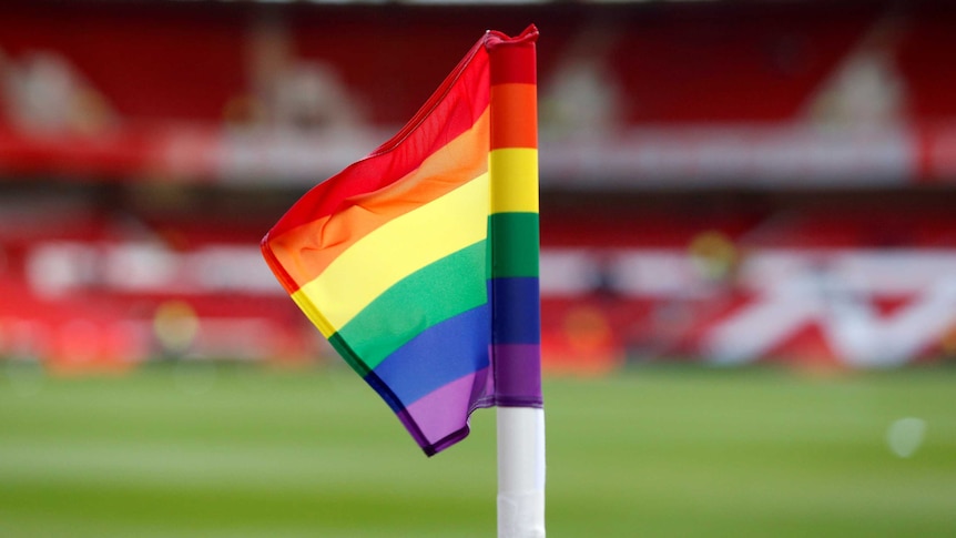 General view of a rainbow corner flag before a football game in England