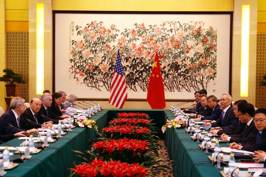 Wilbur Ross, second from left, and Chinese Vice Premier Liu He, fourth right, in a meeting.