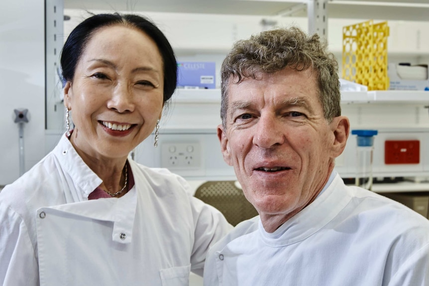 Ian Frazer and the late Jian Zhou's wife Xiao Yi Sun.