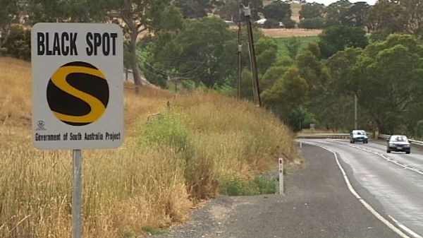 Black Spot road sign