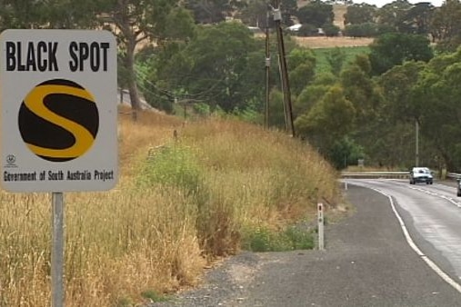 Black Spot road sign