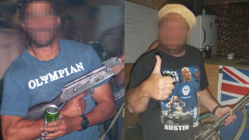 Two men in civilian clothing holding guns
