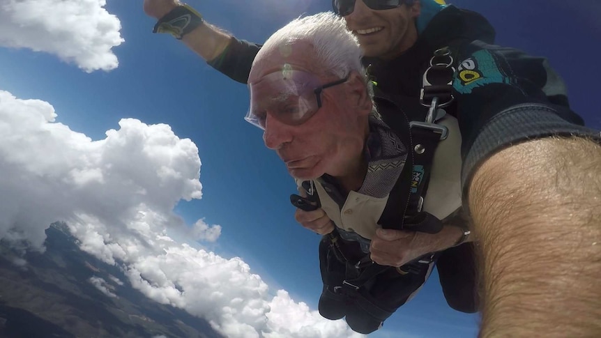 Sam Westwood free-falling during a tandem skydive at Trunkey Creek