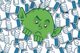A graphic of a green troll nestled amongst a sea of social media "likes".