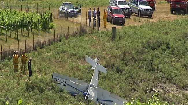 An ultralight plane crashes in a Tasmanian vineyard killing the pilot.