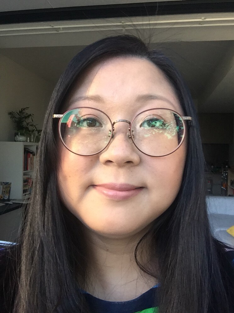 A selfie of Jennifer Wong with makeup.