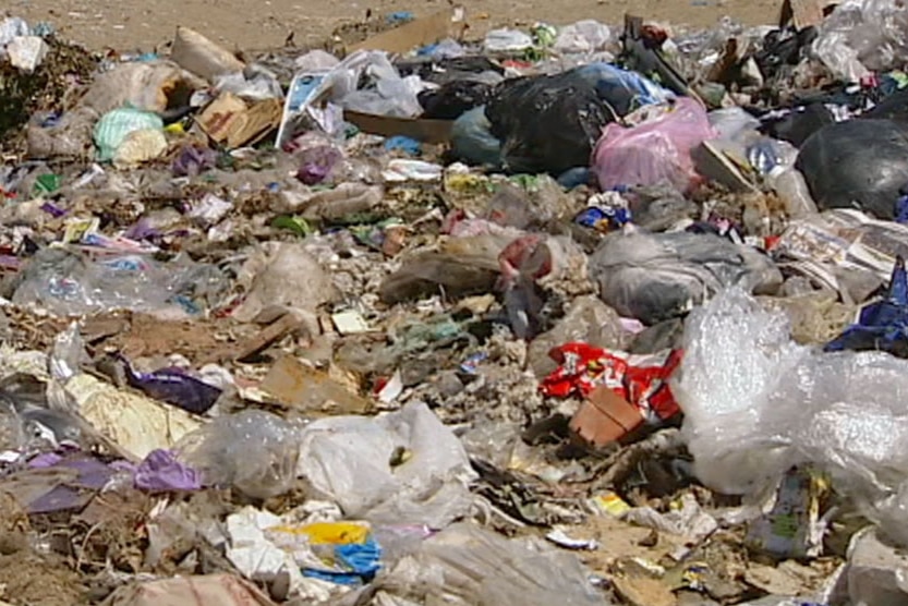 Video still: close-up of rubbish in a Canberra landfill - generic