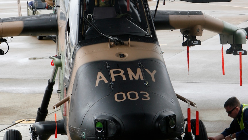 Law allegedly broke into the Rockhampton Airport and attacked an Australian Army Tiger helicopter with a mattock.