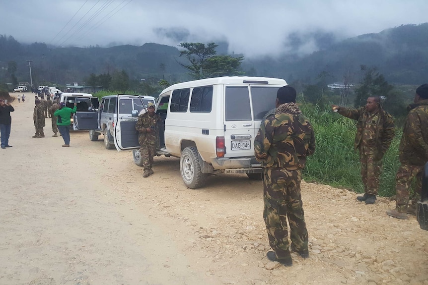 PNG soldiers and police on their way to Hela Province in the PNG Highlands.