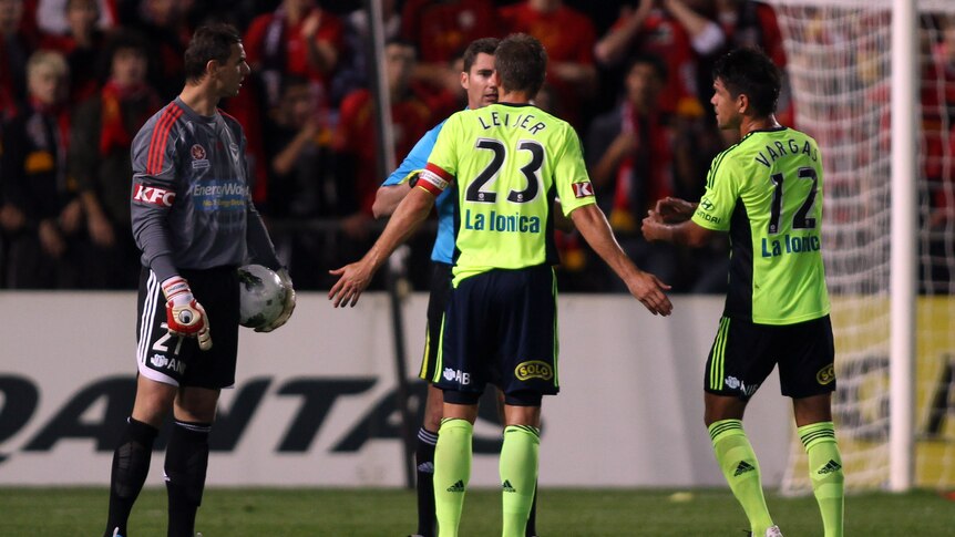 Melbourne's Adrian Leijer (centre) was sent off after receiving two yellow cards during another disappointing result for the Victory.