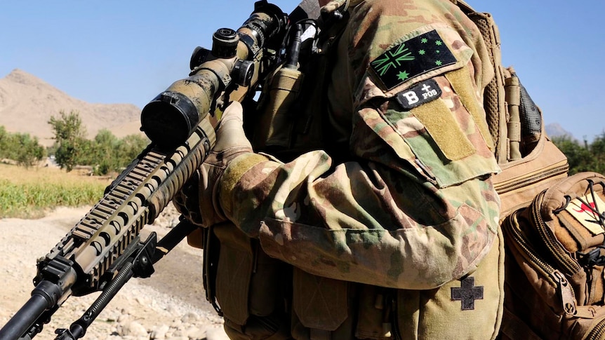 An Australian soldier provides security in southern Afghanistan.