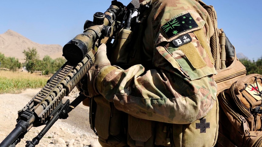 Australian soldier with weapon