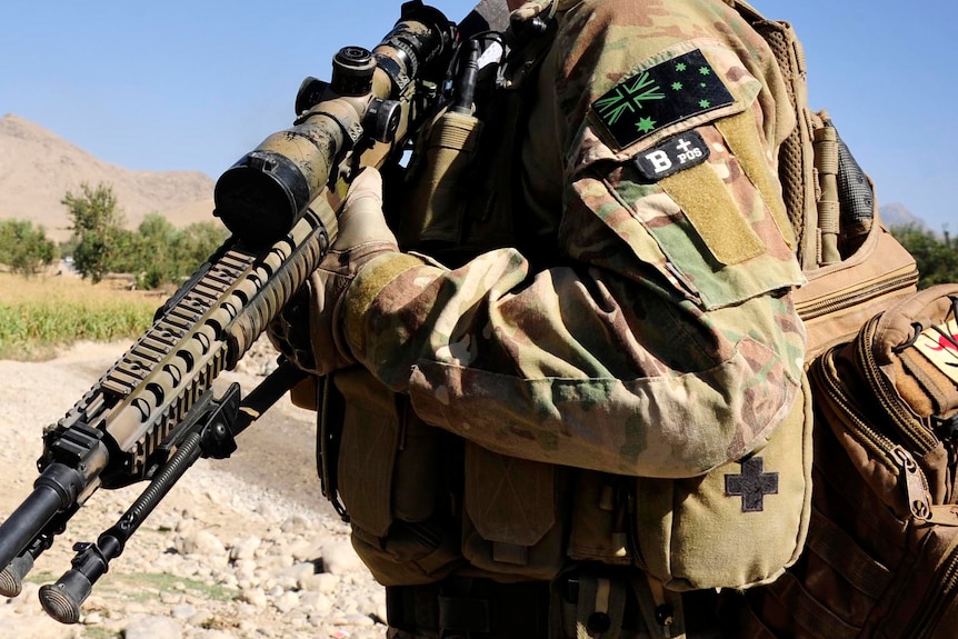 An Australian soldier provides security in southern Afghanistan.