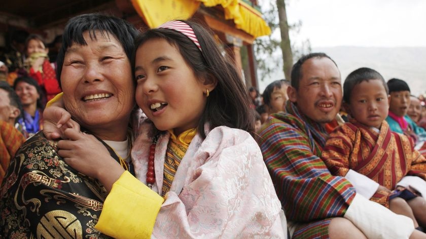 Bhutan's approach: focus not on the bottom line, but the size of your smile