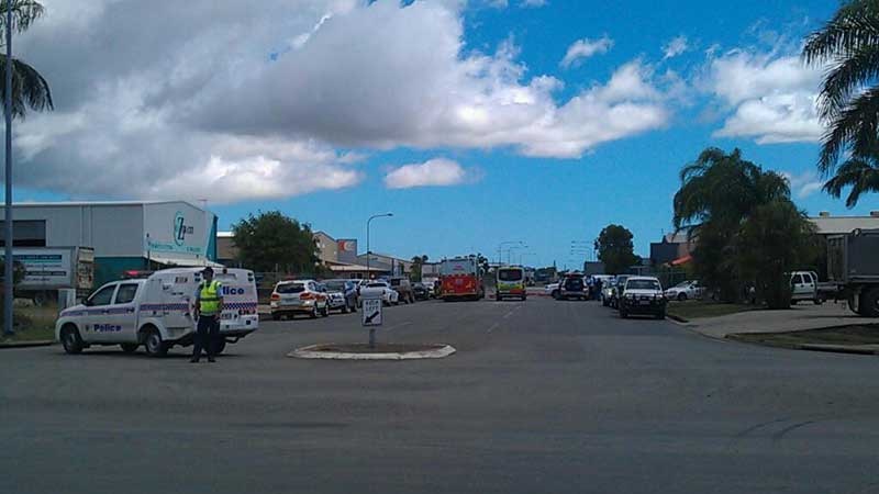 Authorities set up an exclusion zone at an industrial estate in Central Park Drive at Paget in Mackay in north Qld