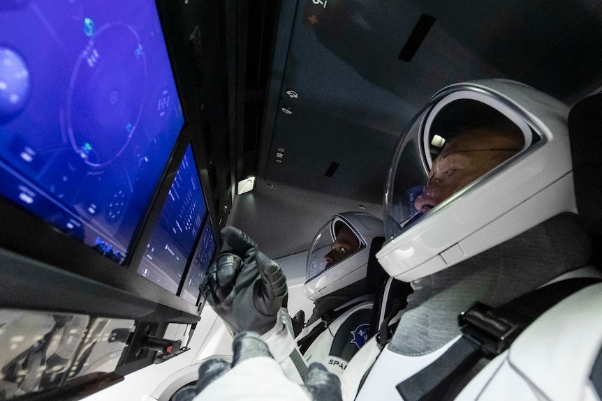 SpaceX astronauts in flight simulator