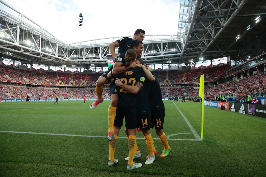 Socceroos celebrate goal against Chile