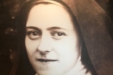 Black and white photograph of a nun