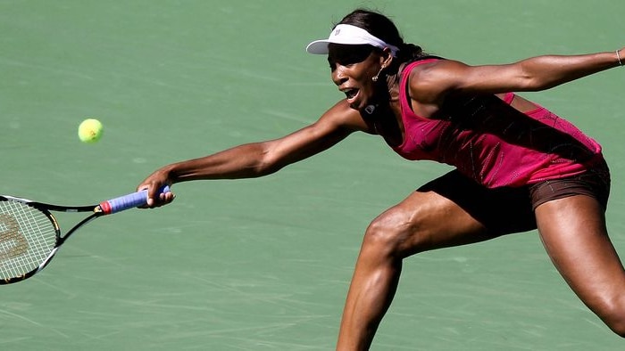 Venus Williams stretches for a return
