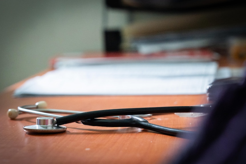 A photo of a stethoscope on a table.