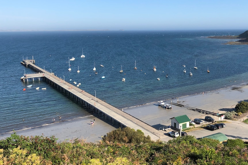 An elevated view of the Flinders Pier, including a concrete L-shaped addition to the original wooden jetty.